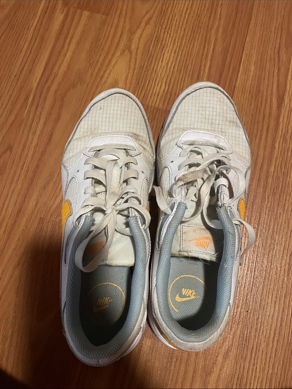 Nike White Sneakers with Yellow Swoosh